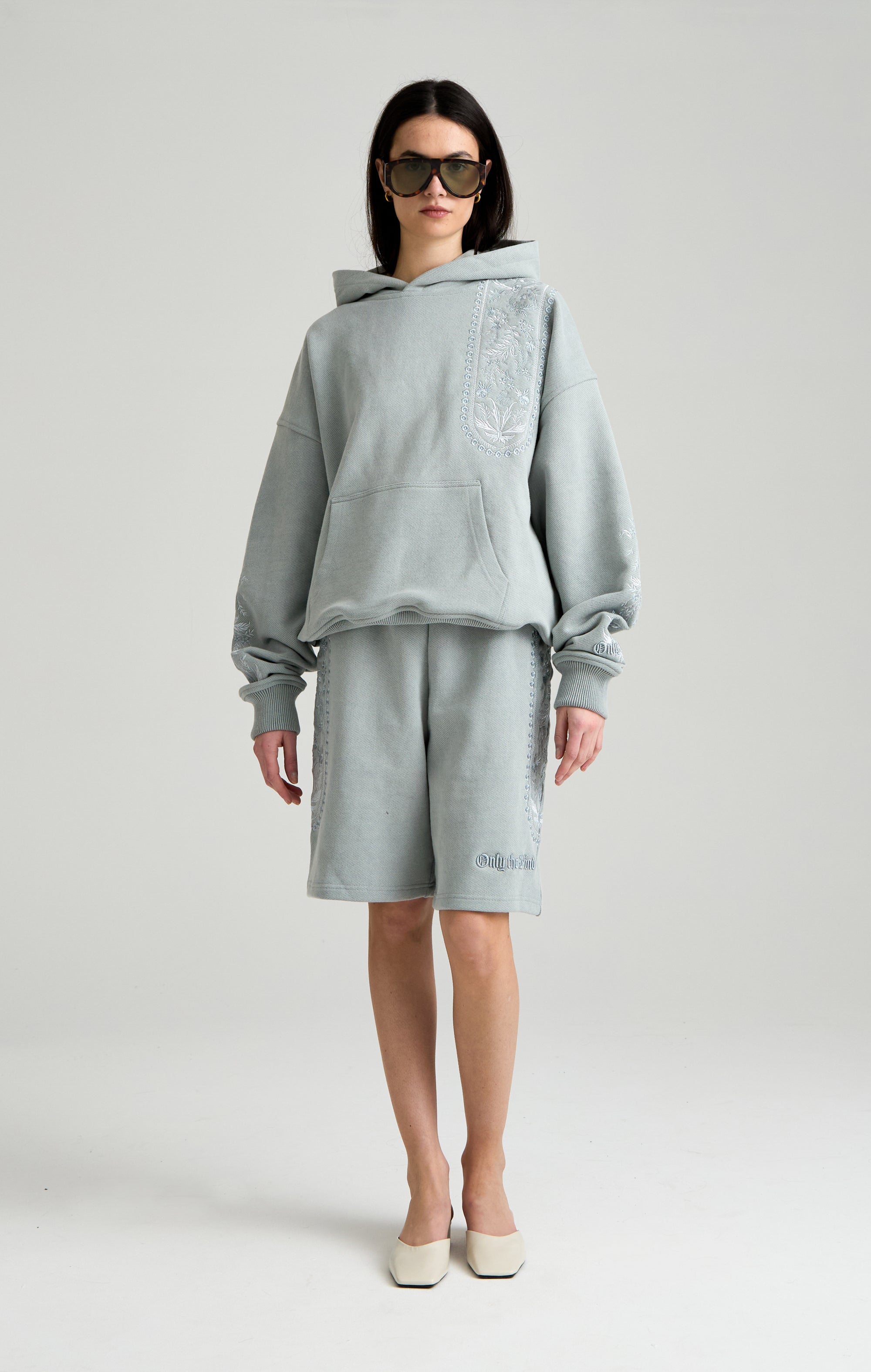 TAPESTRY IN GREY HOOD