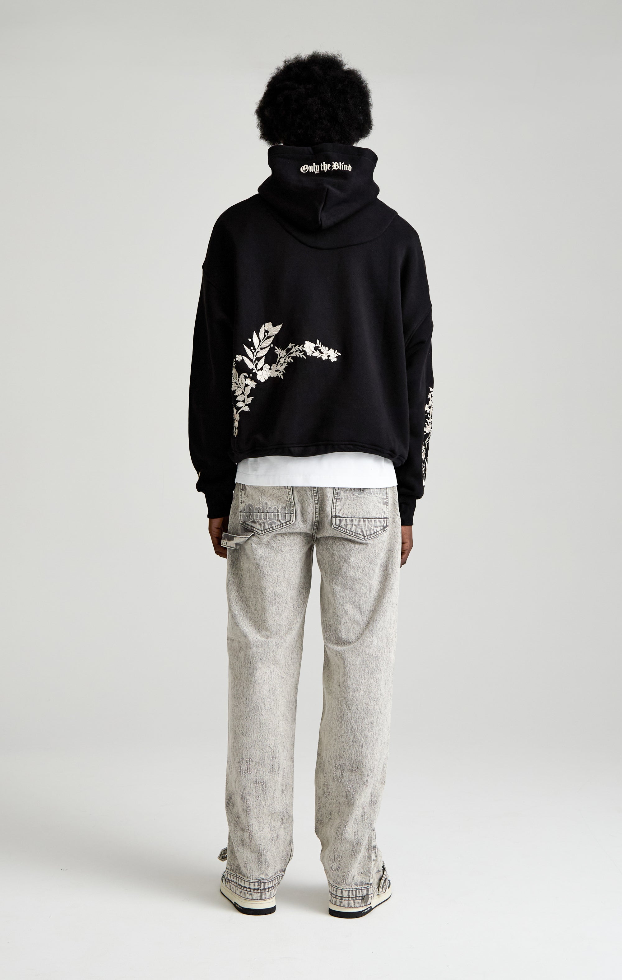 WHISPERS IN THE BLOOM HOOD