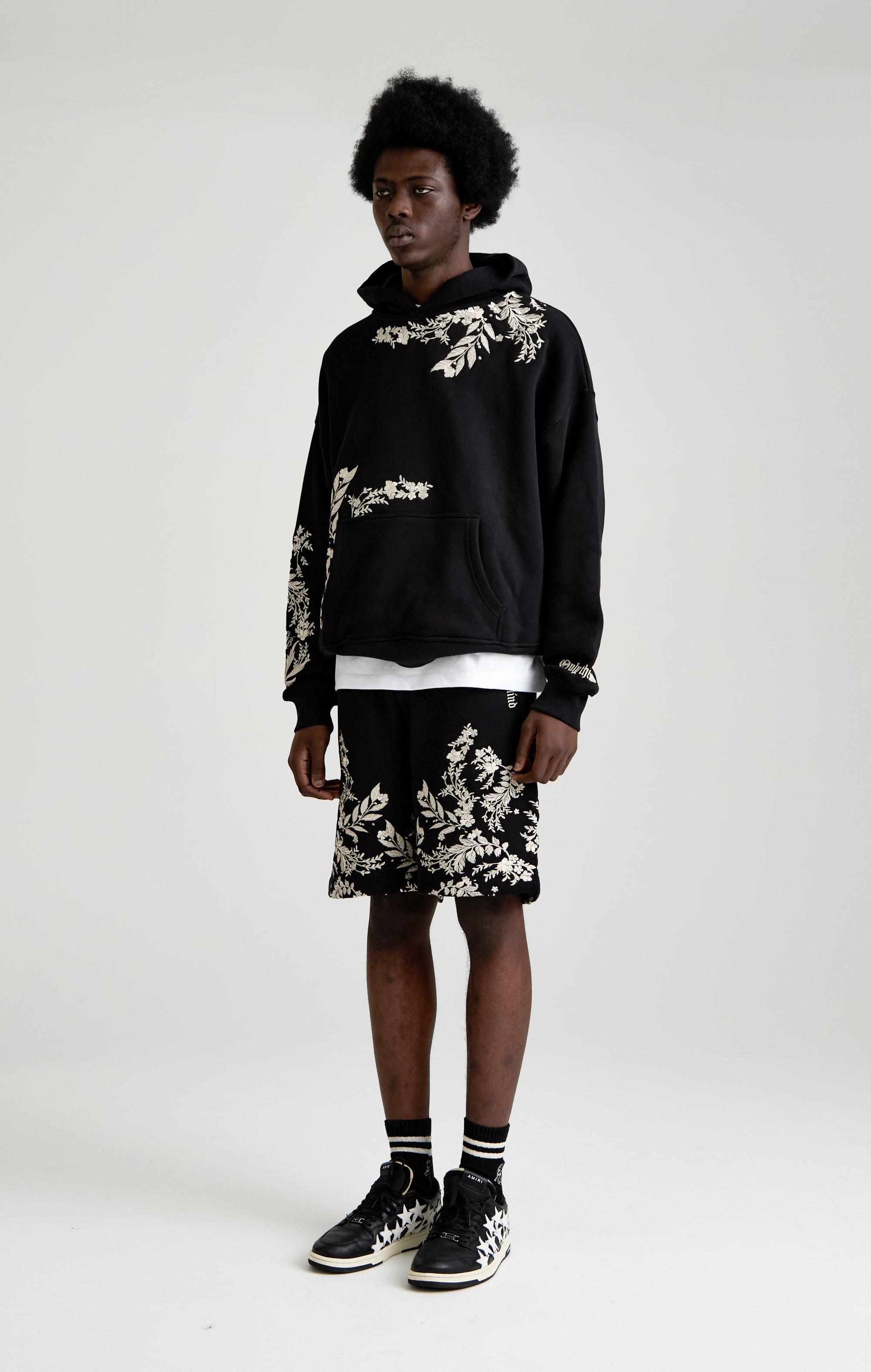 WHISPERS IN THE BLOOM HOOD