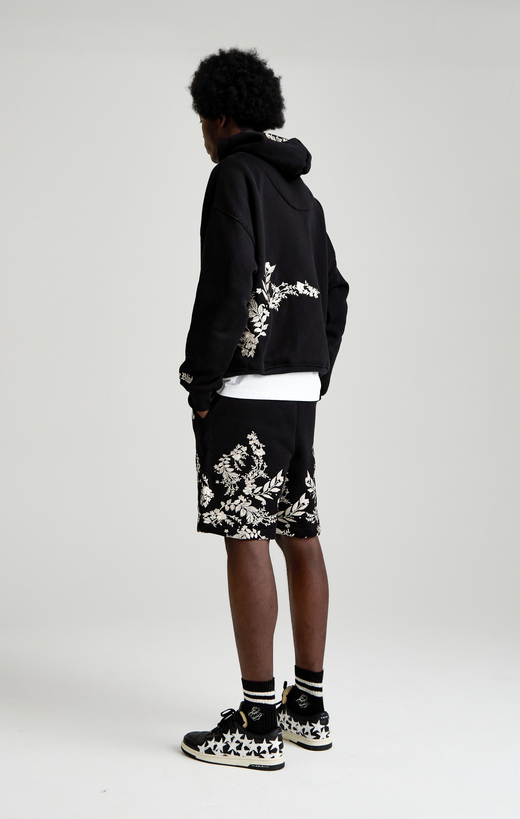 WHISPERS IN THE BLOOM HOOD