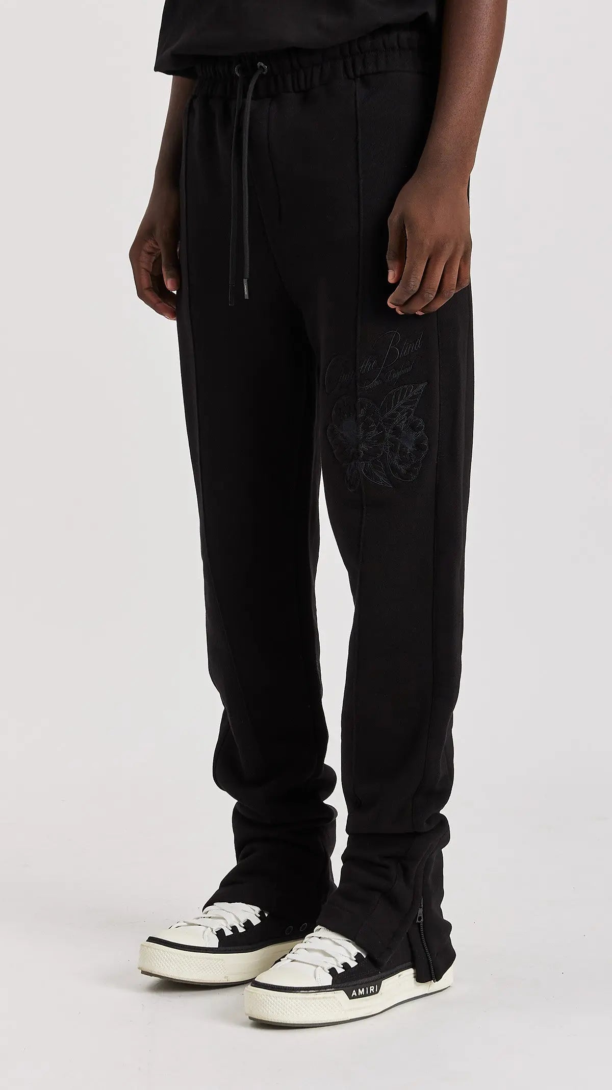 BLACK FLORAL SPLIT HEM SWEATPANTS