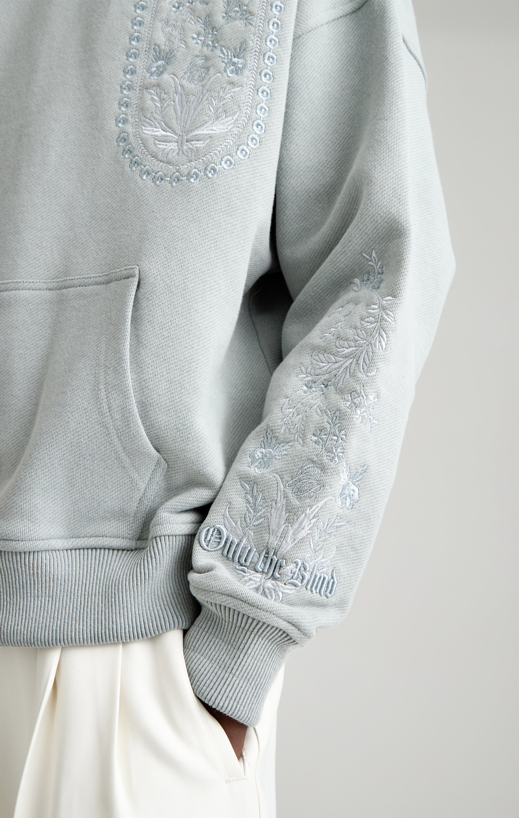 TAPESTRY IN GREY HOOD