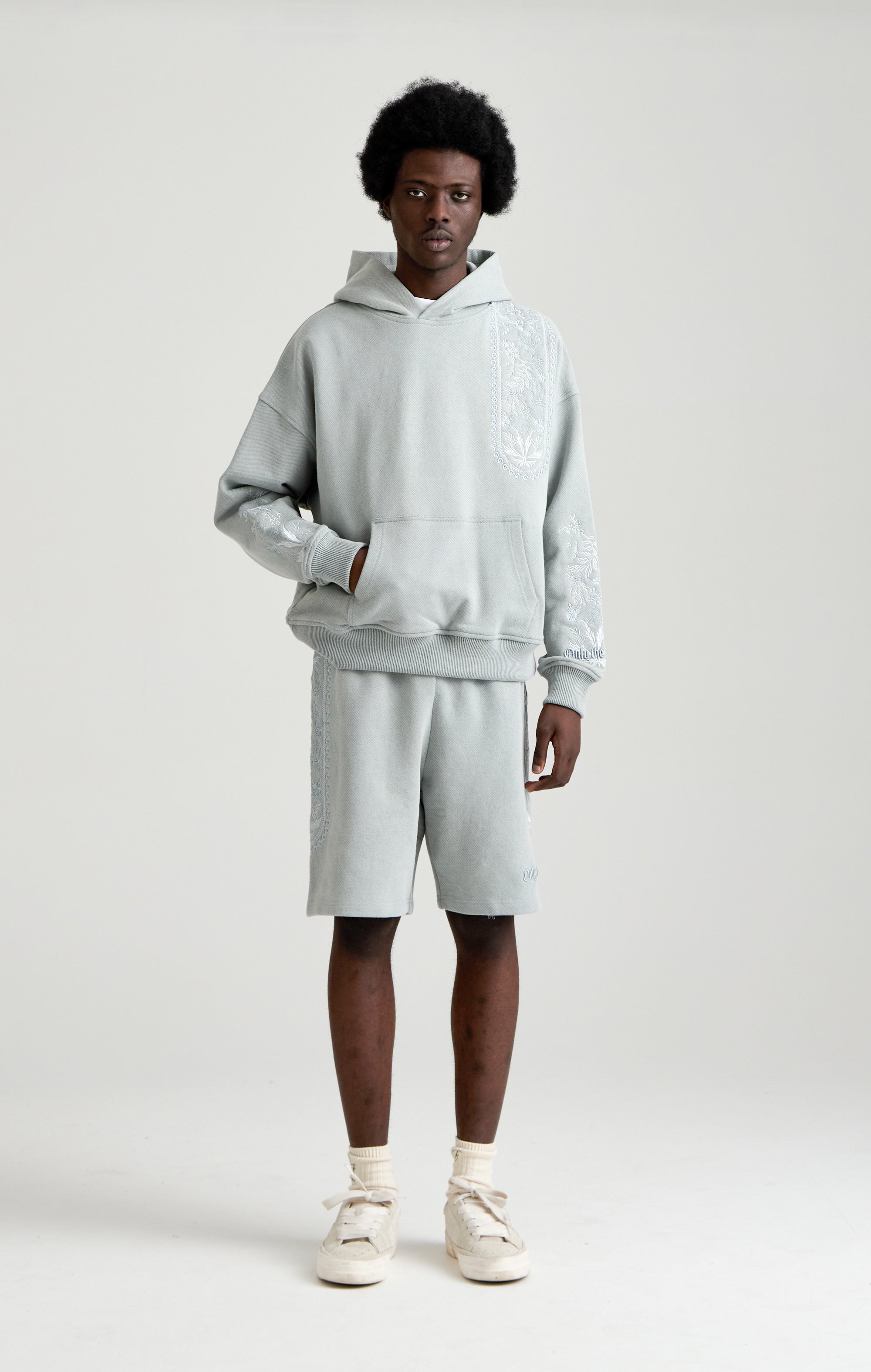 TAPESTRY IN GREY HOOD