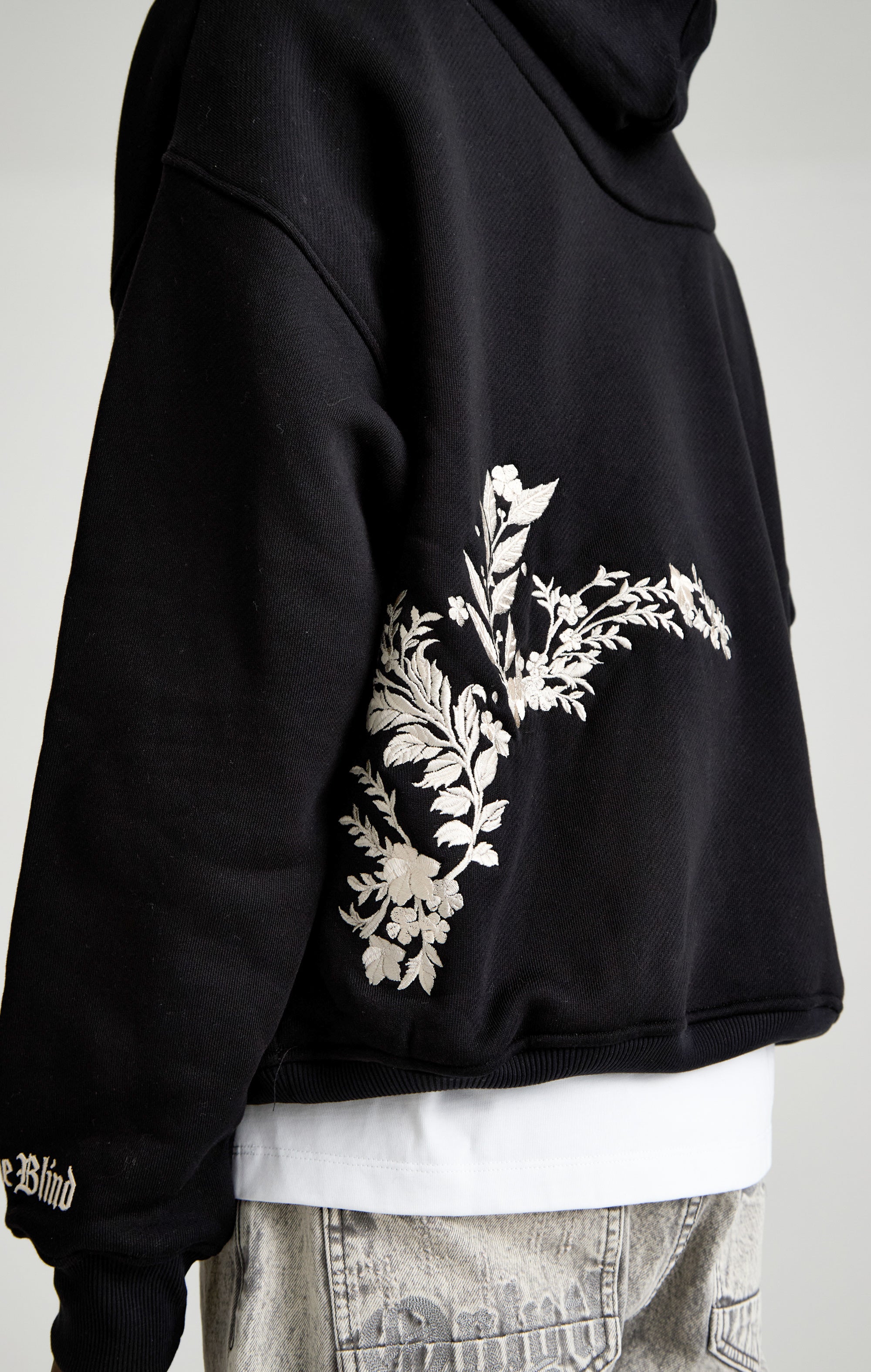 WHISPERS IN THE BLOOM HOOD